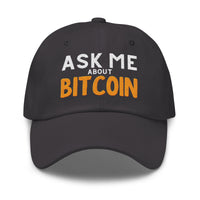 Load image into Gallery viewer, Front view of dark grey &quot;Ask Me About Bitcoin&quot; dad hat with embroidered text, casual unstructured fit.
