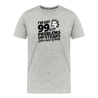 Load image into Gallery viewer, I&#39;ve Got 99 Problems and Steaks Solve Most of Them Carnivore T-Shirt in athletic heather color, unisex design, short sleeve
