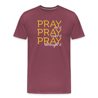 Load image into Gallery viewer, maroon christian graphic t-shirt with yellow and white “pray on it over it through it” text design
